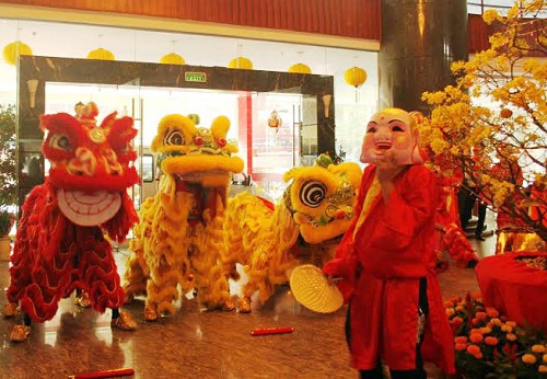   A lion dance group first footing at a local business to bring good luck.