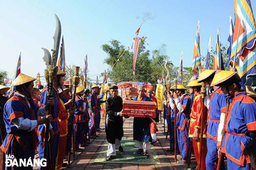   Receiving the royal diplomas.