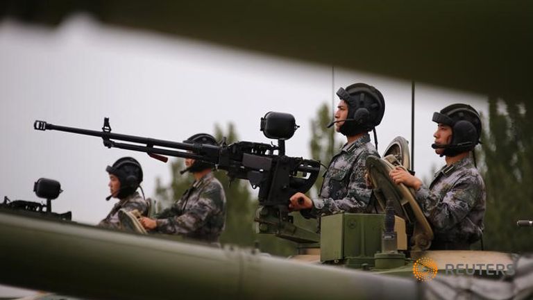 Lực lượng xe tăng của Quân giải phóng Trung Quốc trong một cuộc tập trận gần thủ đô Bắc Kinh, hôm 22-7-2014. Ảnh: Reuters