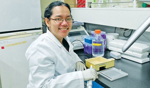 Dr. Tran Ha Lien Phuong is pictured in a university lab in Ho Chi Minh City. Tuoi Tre