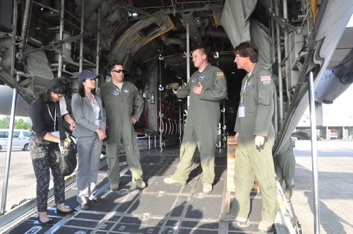 Crew members of the C-130 Hercules present the plane's features to Vietnamese reporters