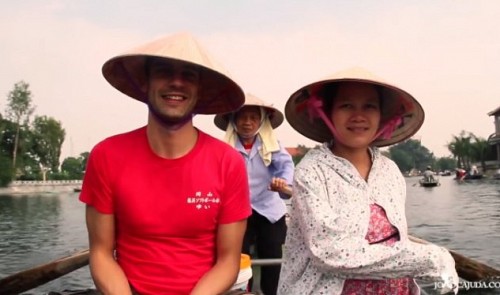 Portuguese tourist João Cajuda (in red shirt)