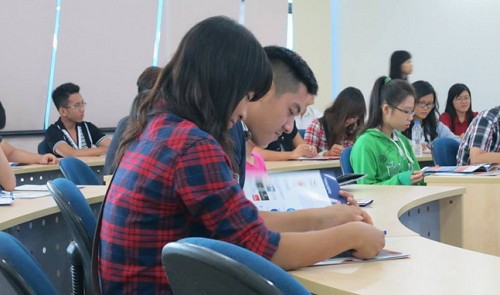 Students attend a class at the American Polytechnic College in Ho Chi Minh City in this photo posted on the school's Facebook page.