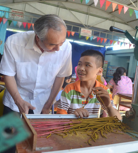 A disabled boy attending a local vocational training course