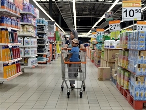 A woman shops at a supermarket in Kuala Lumpur