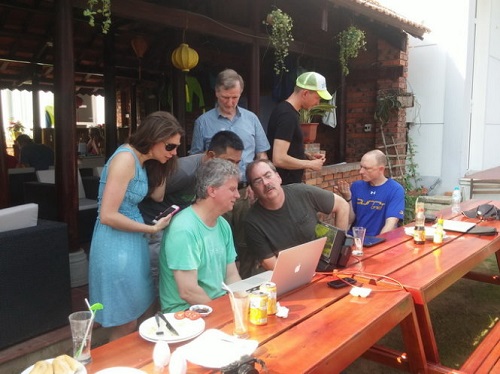 Maria Stefanopoulos (first left), production manager at ABC News, Good Morning America, and creator of the May 13, 2015 show on a Vietnamese cave, discusses the program with her crewmembers. 