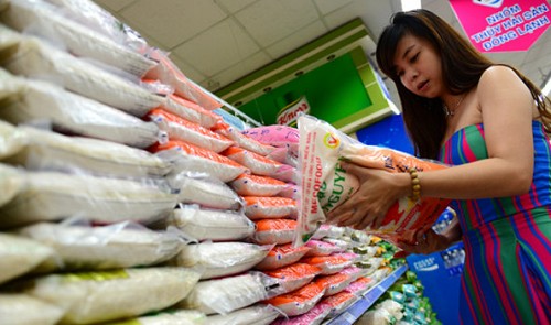 A consumer buys rice at a supermarket in Ho Chi Minh City.
