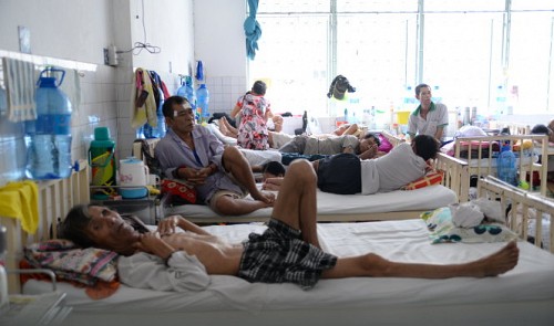 many cancer patients having to share one bed at the Ho Chi Minh City Oncology Hospital, one of the top medical treatment facilities for the disease in the southern region.