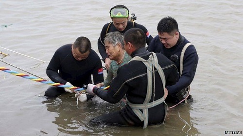 A 65-year-old woman was among those rescued from the hull of the ship