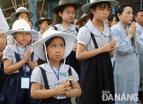    Child Buddhist followers at the event