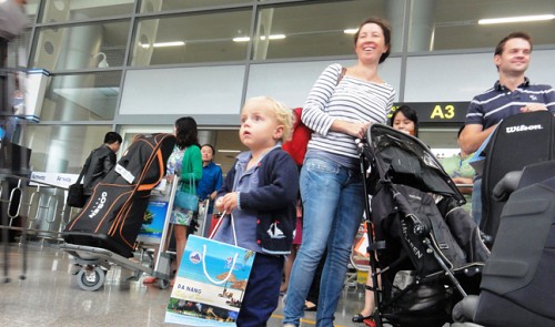 Foreign tourists are seen at the Da Nang International Airport on January 31, 2014.