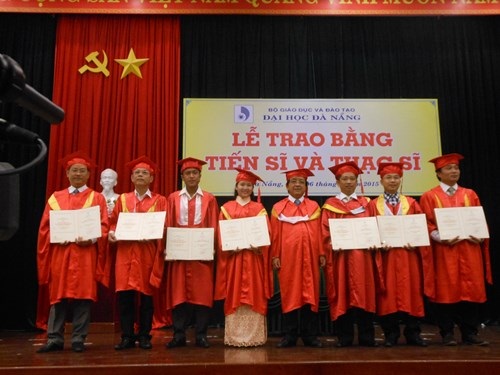 The UD’s Director, Professor Tran Van Nam (fourth right), and some of the Doctorate holders