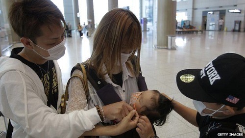 Members of the public have been wearing masks to protect themselves