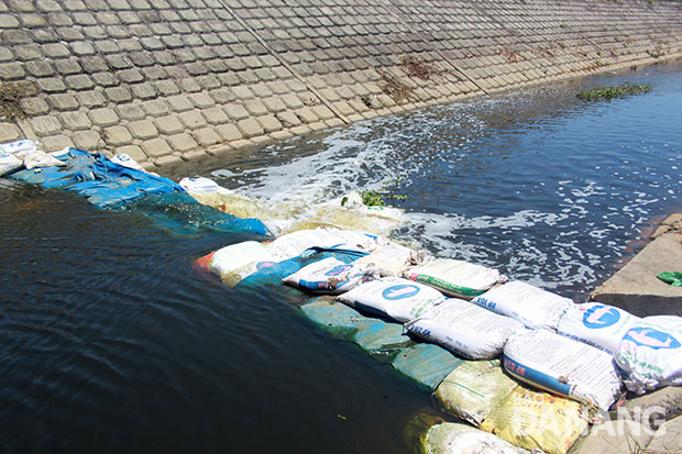 Kênh Hòa Minh được bổ sung dòng chảy từ hồ điều tiết Hòa Phú để tăng mực nước và dòng chảy, giảm thiểu ô nhiễm môi trường.