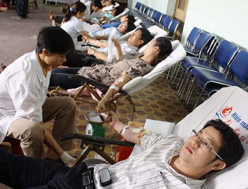 Local volunteers donating blood