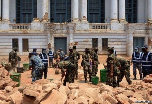 Soldiers at work clearing a street of Durbar Square