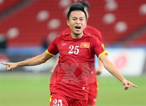 Vo Huy Toan celebrates after scoring a goal (Photo: VNA)