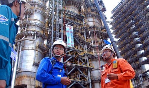 PetroVietnam's Binh Son Refinery and Petrochemical employees are seen at Dung Quat refinery in Quang Ngai Province