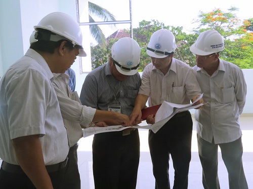 Representatives of local departments and agencies checking progress at the General Science Library