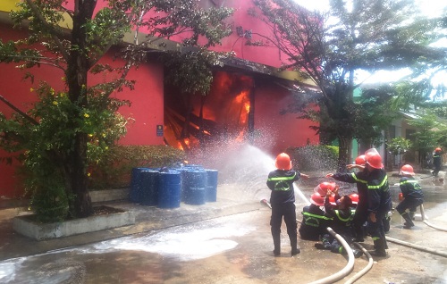 Firefighters extinguishing the blaze