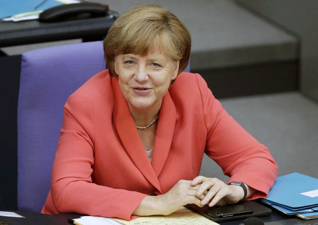 Đầu năm 2016, Thủ tướng Angela Merkel sẽ công bố việc có tranh cử nhiệm kỳ mới hay không. 		      Ảnh: AP