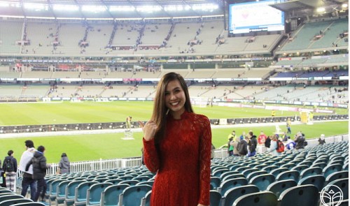 Nguyen Thi Thu Thuy poses in an 'ao dai' at Melbourne Cricket Ground.