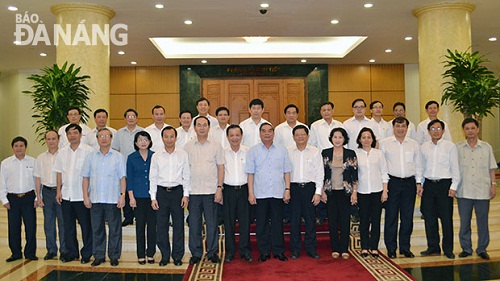 Representatives from the Politburo and the Central Committee’s Secretariat with some of the city leaders