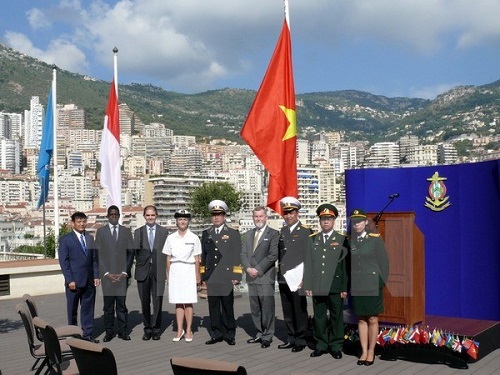 Participants at the flag hoisting ceremony in Monaco