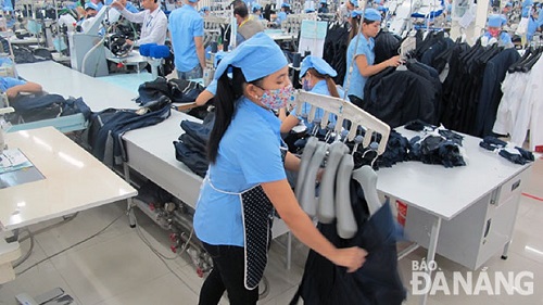 Workers at the Hoa Tho Textiles and Garments Company  