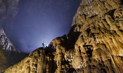 A man is seen discovering Son Doong Cave in Quang Binh Province