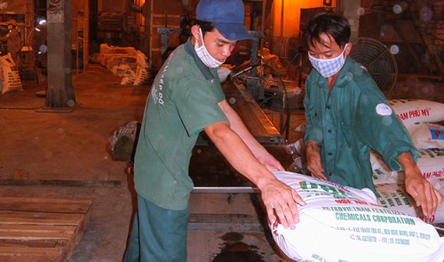 Employees work at a Vinachem fertilizer plant in Ba Ria - Vung Tau Province