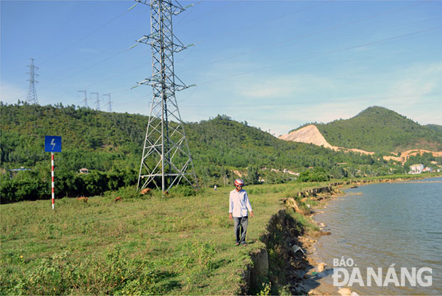  Bờ sông Cu Đê bị sạt lở đe dọa sự an toàn cả trụ điện đường dây 220kV.