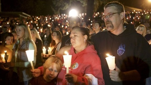 A vigil was held in a Roseburg park on Thursday evening