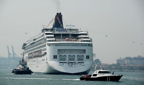 The Superstar Virgo cruise vessel enters the dock at Harbour Front cruise terminal in Singapore on June 14, 2013. AFP