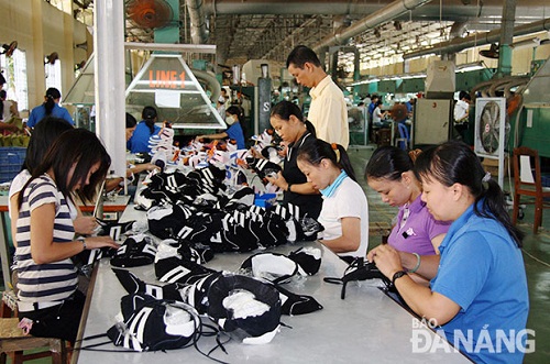   Making shoes at a local factory 