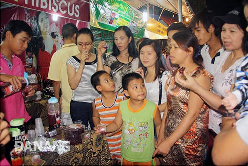   Local customers trying Hibiscus wine