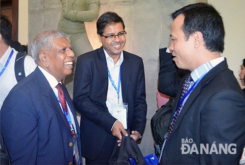 Delegates in discussion on the sidelines of the event