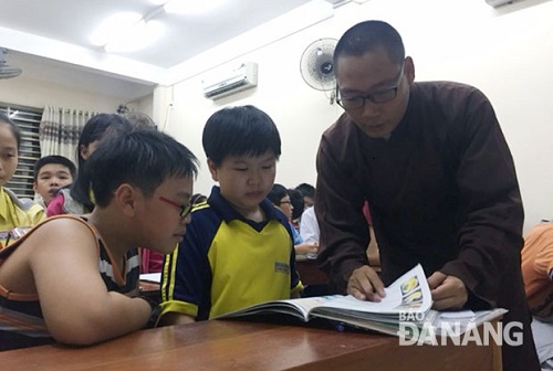 Buddhist monk Thich Thanh Luong and some of his pupils