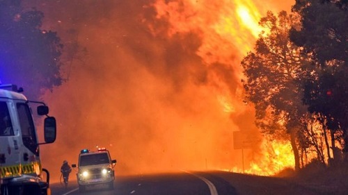 This handout photo from firefighters shows the Waroona fire burning near Yarloop