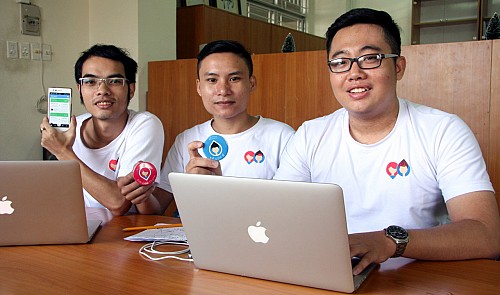 From R to L: Huynh Phuong Duy, Le van Tai and Nguyen Thanh An, the creators of PinBike, a Vietnamese application which allows drivers and hitchhikers to share a ride on the same route they travel. Tuoi Tre