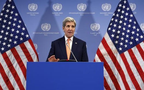 Ngoại trưởng Mỹ John Kerry tuyên bố dỡ bỏ lệnh trừng phạt đối với Iran, tại Vienna, Áo, ngày 16/1 - Ảnh: Reuters.