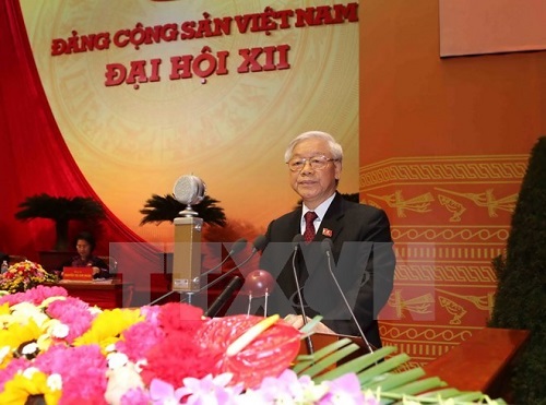 Party General Secretary Nguyen Phu Trong delivers the report 