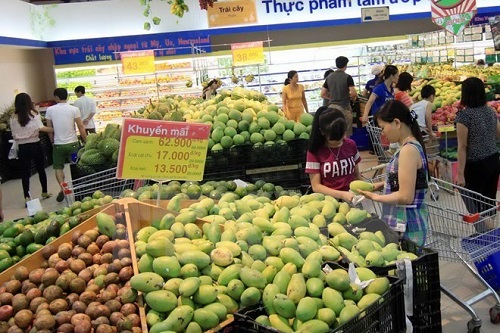 Consumers shop at a supermarket