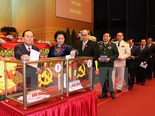 Delegates cast their votes on members of the 12th Party Central Committee