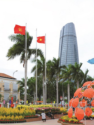 The national flag and the flag of the Communist Party of Viet Nam proudly fluttering in the breeze