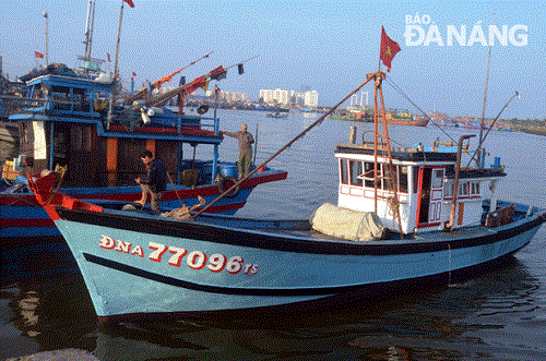 Some fishing vessels docking at the wharf 