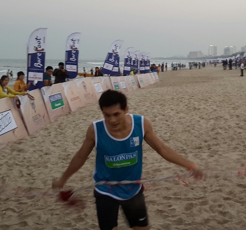 Winner Pham Ngoc Quang finishes the 2km race 