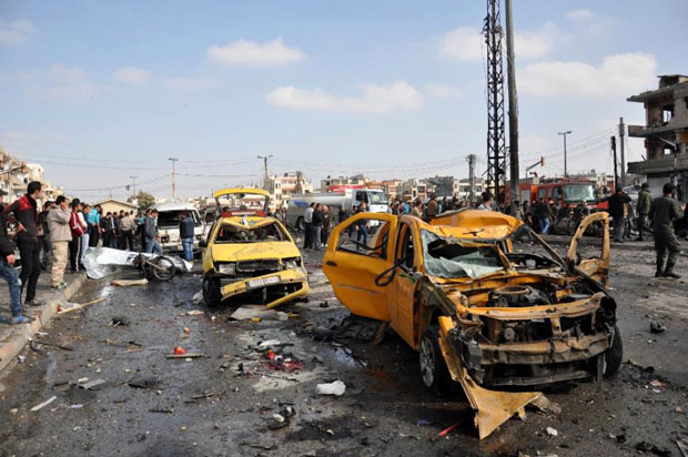 Các vụ đánh bom liều chết ở thành phố Homs gây chấn động Syria. 			Ảnh: AFP
