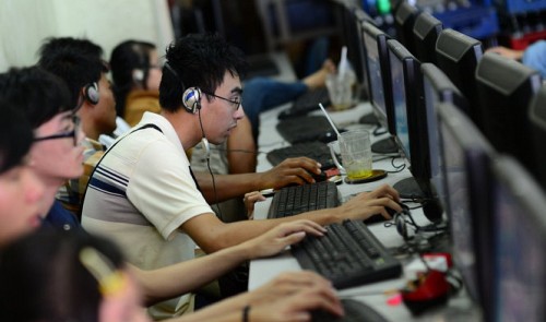 People are pictured at an Internet café in Ho Chi Minh City. Tuoi Tre