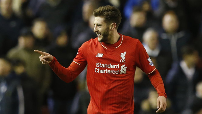 Niềm vui của Lallana sau khi mở tỉ số cho Liverpool. Ảnh: Reuters